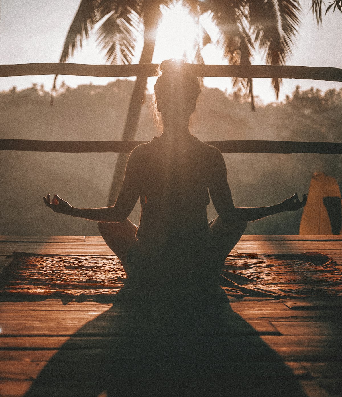 Person meditating peacefully with eyes closed in breathwork session